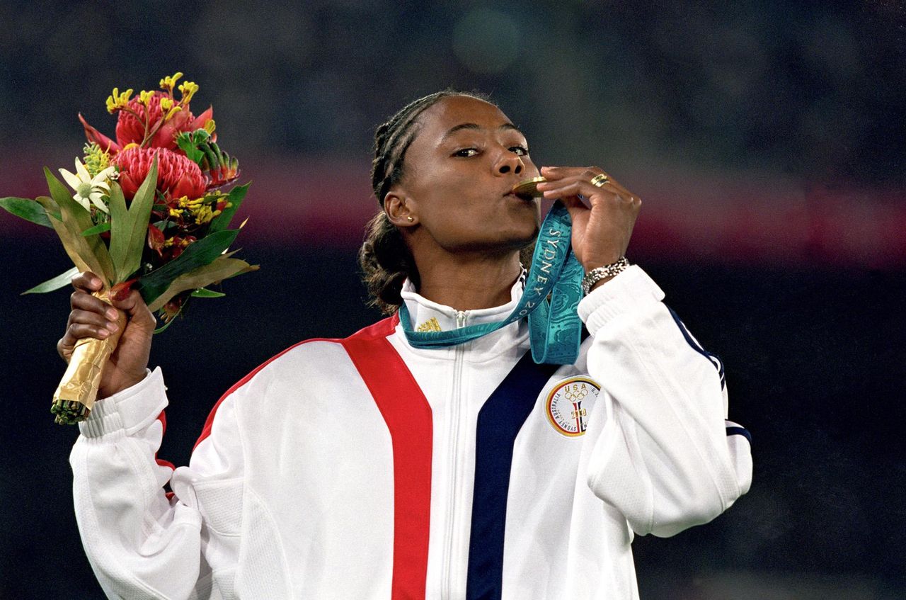 Le_due_nozze_di_Marion_Jones_ze51EtOv7E - Confidenze24 source:usmagazine - Le due nozze di Marion Jones - Marion Jones alle Olimpiadi del 2000