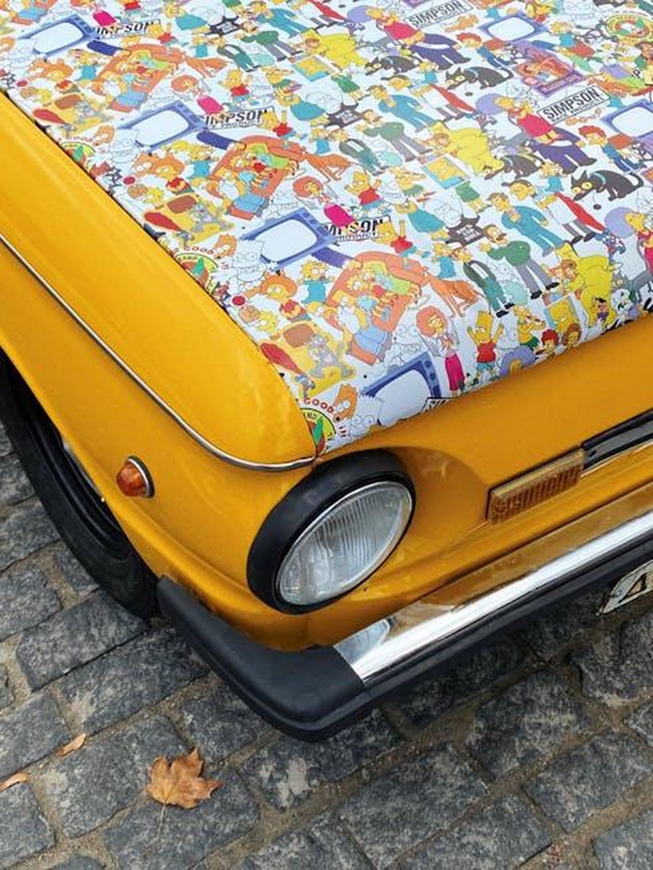 Futuro_della_serie_originale_FBI_CvmPufKfMY - Confidenze24 Source: Annie Starichenko - pexels - A vibrant vintage car with Simpson-themed artwork on the hood in Kharkiv, Ukraine.