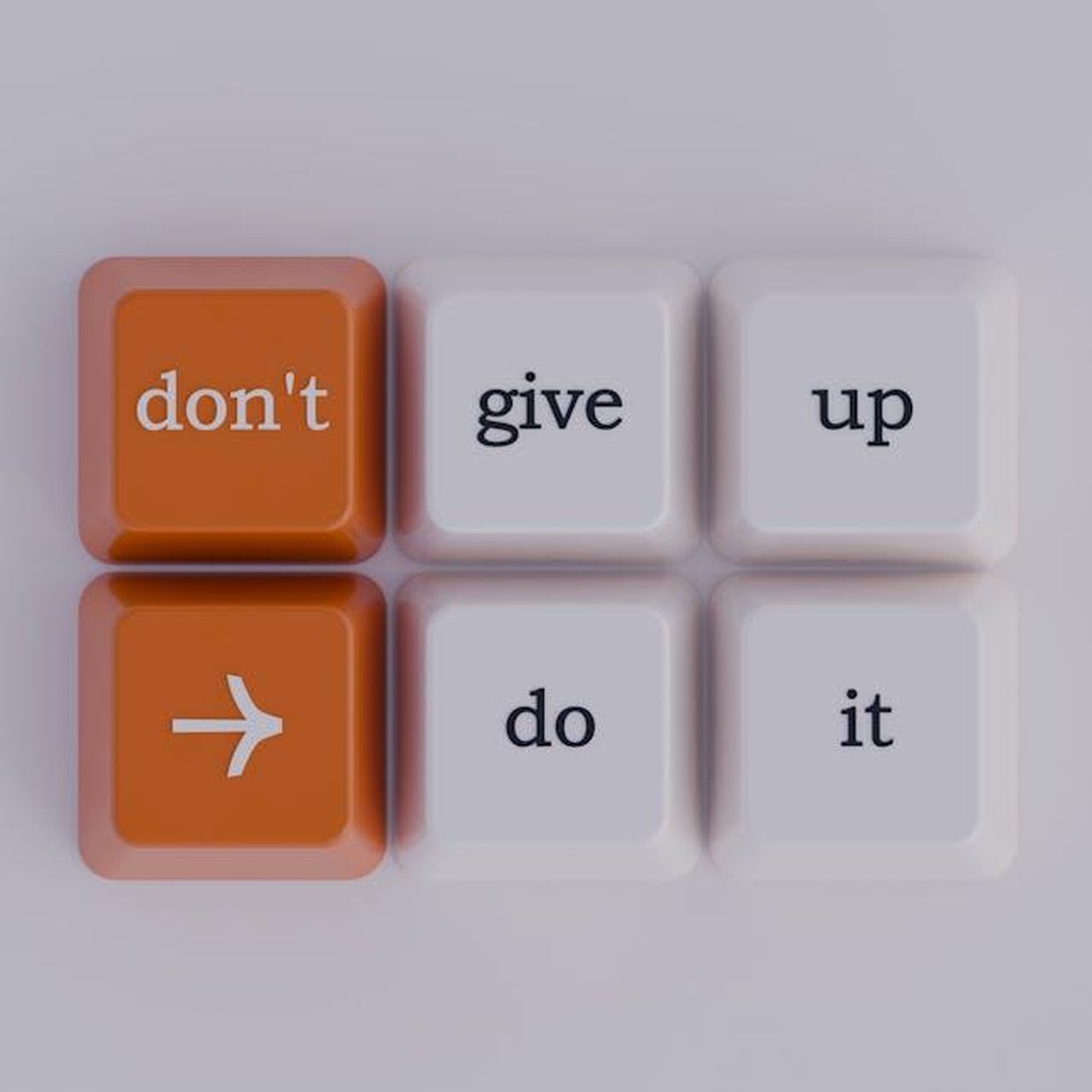 Il_grande_successo_di_Pippin_U2mTkwfB2k - Confidenze24 Source: Pușcaș Adryan - pexels - Keyboard keys spelling out 'don't give up' message, simple and inspiring.